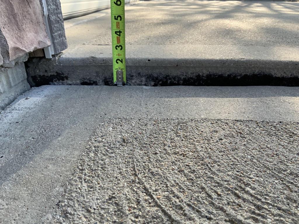 Slabjacking is a concrete repair sidewalk lifting